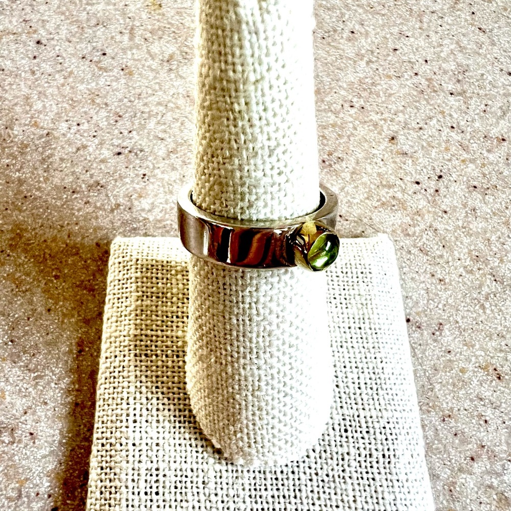 Peridot set in 14 KT Gold on Sterling Silver Band